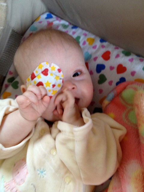 Lyra looking unusually happy during morning eye patch hour.